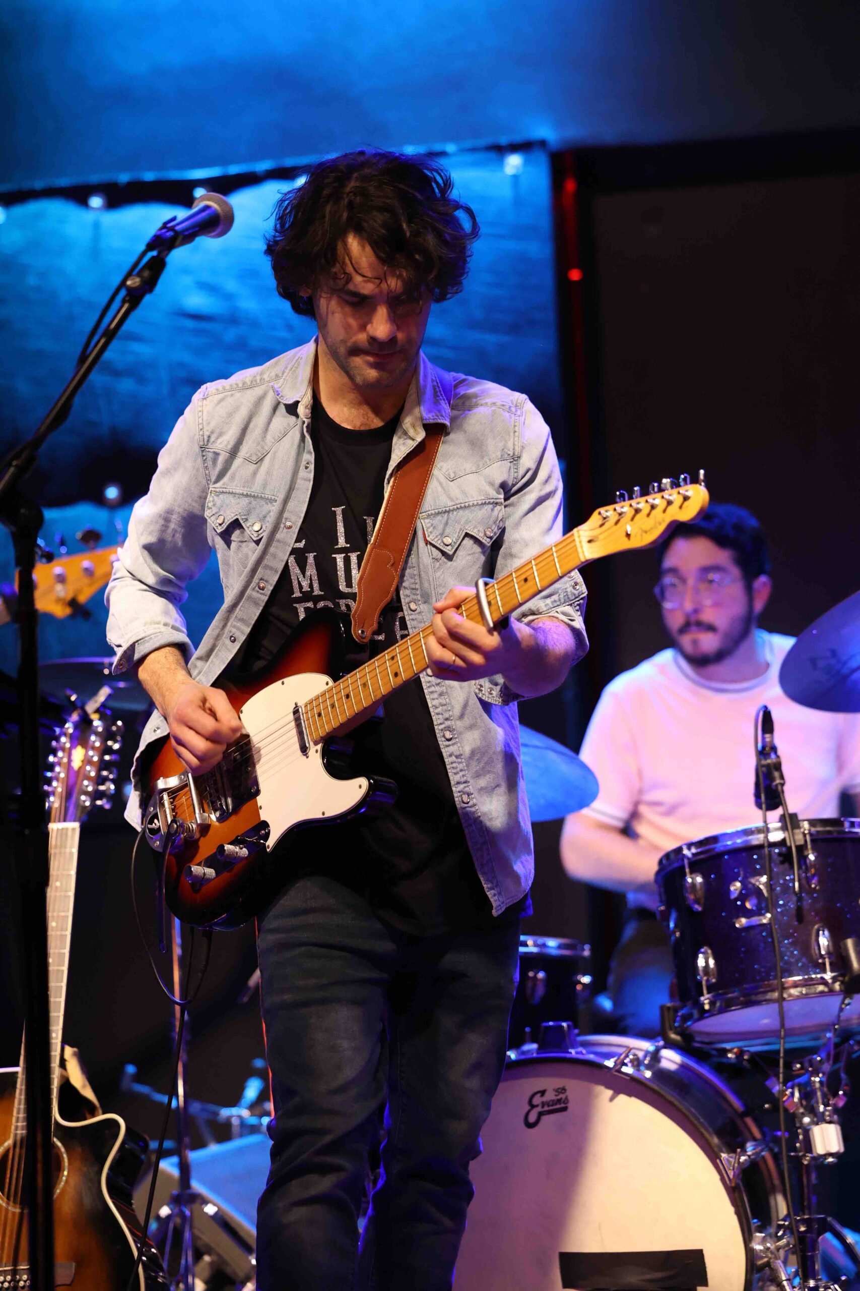 Nicholas Emden playing the guitar.